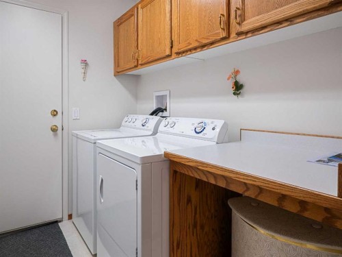 277 Arbour Cliff Close Nw, Calgary, AB - Indoor Photo Showing Laundry Room