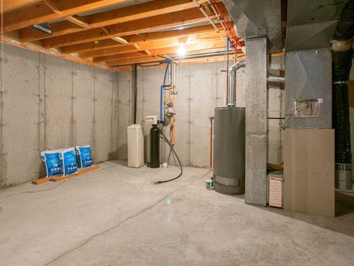 277 Arbour Cliff Close Nw, Calgary, AB - Indoor Photo Showing Basement