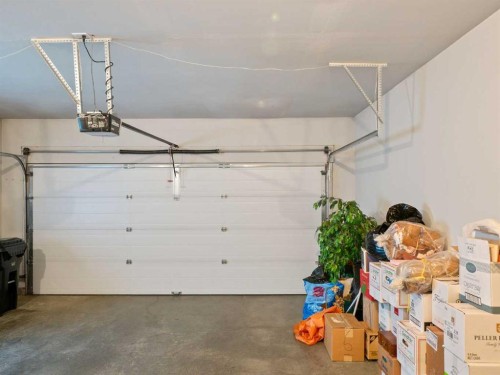 277 Arbour Cliff Close Nw, Calgary, AB - Indoor Photo Showing Garage