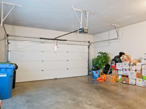277 Arbour Cliff Close Nw, Calgary, AB - Indoor Photo Showing Garage