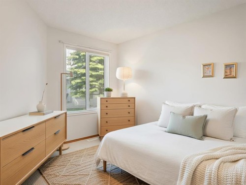 277 Arbour Cliff Close Nw, Calgary, AB - Indoor Photo Showing Bedroom