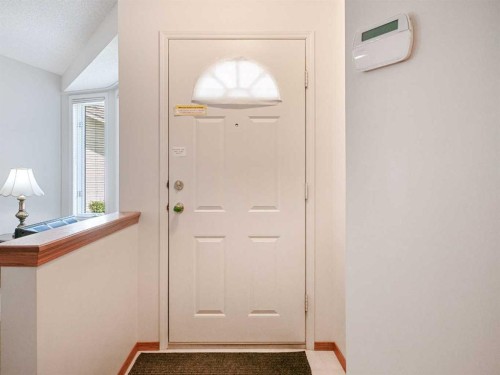 277 Arbour Cliff Close Nw, Calgary, AB - Indoor Photo Showing Other Room