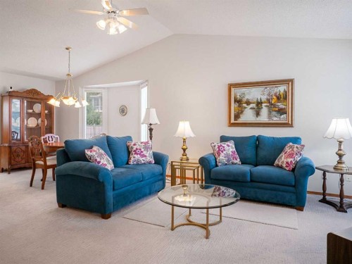 277 Arbour Cliff Close Nw, Calgary, AB - Indoor Photo Showing Living Room