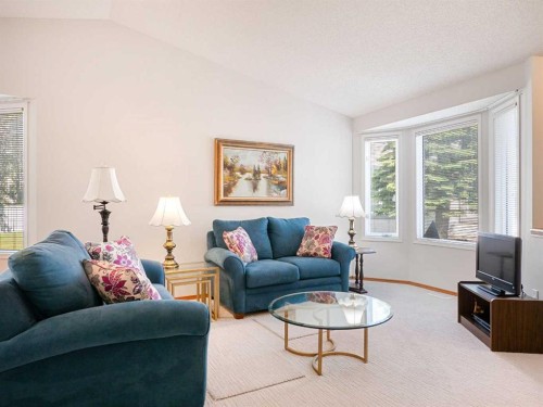 277 Arbour Cliff Close Nw, Calgary, AB - Indoor Photo Showing Living Room