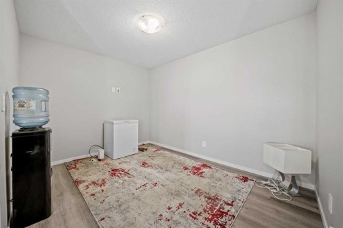 220 Windbury Lane Sw, Airdrie, AB - Indoor Photo Showing Other Room