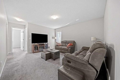 220 Windbury Lane Sw, Airdrie, AB - Indoor Photo Showing Living Room