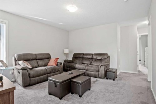 220 Windbury Lane Sw, Airdrie, AB - Indoor Photo Showing Living Room