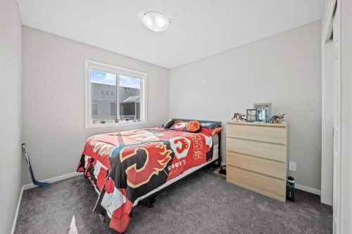220 Windbury Lane Sw, Airdrie, AB - Indoor Photo Showing Bedroom