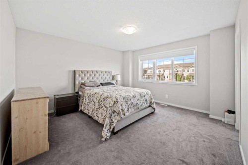 220 Windbury Lane Sw, Airdrie, AB - Indoor Photo Showing Bedroom