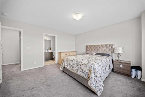 220 Windbury Lane Sw, Airdrie, AB - Indoor Photo Showing Bedroom