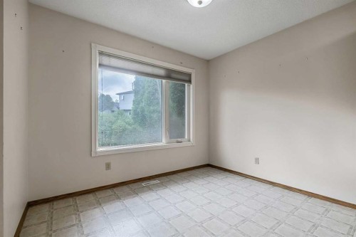 25 Downey Road, Okotoks, AB - Indoor Photo Showing Other Room
