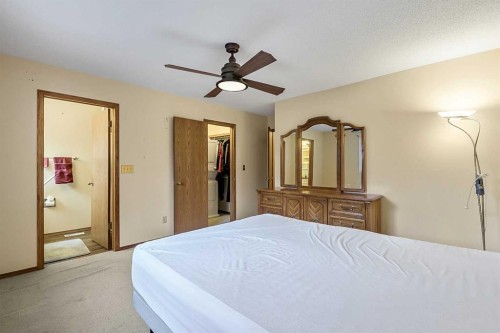 25 Downey Road, Okotoks, AB - Indoor Photo Showing Bedroom