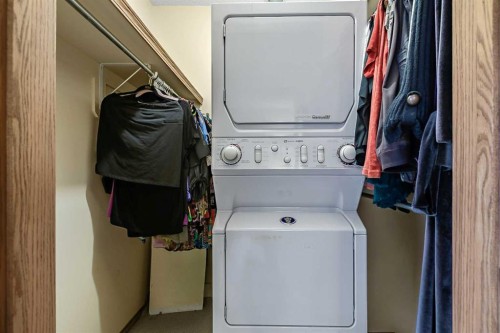 25 Downey Road, Okotoks, AB - Indoor Photo Showing Laundry Room