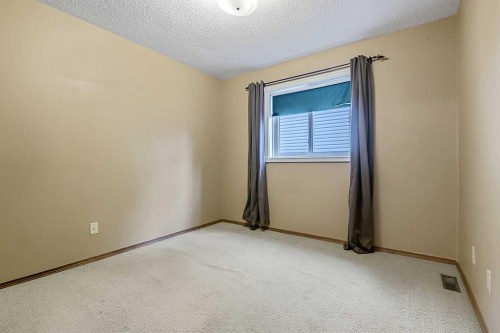 25 Downey Road, Okotoks, AB - Indoor Photo Showing Other Room