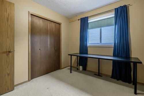 25 Downey Road, Okotoks, AB - Indoor Photo Showing Other Room