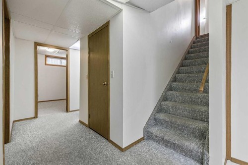 25 Downey Road, Okotoks, AB - Indoor Photo Showing Other Room