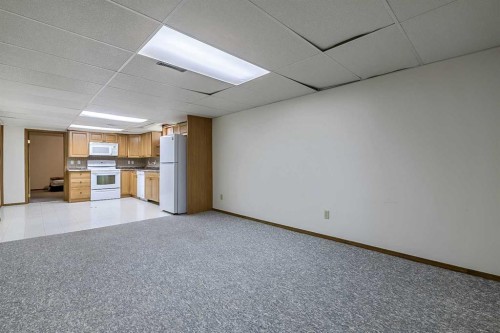 25 Downey Road, Okotoks, AB - Indoor Photo Showing Other Room