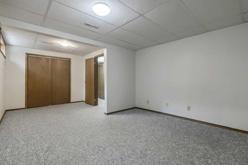 25 Downey Road, Okotoks, AB - Indoor Photo Showing Other Room