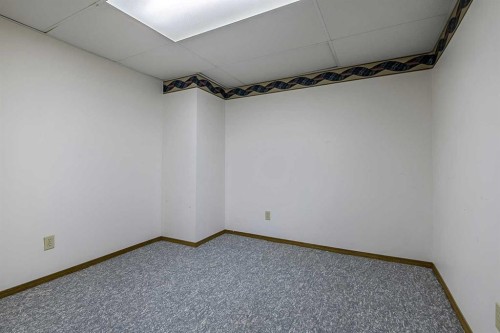 25 Downey Road, Okotoks, AB - Indoor Photo Showing Other Room