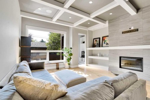 235 11 Avenue Ne, Calgary, AB - Indoor Photo Showing Living Room With Fireplace