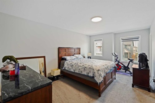 2320 Lancaster Heights Se, Airdrie, AB - Indoor Photo Showing Bedroom