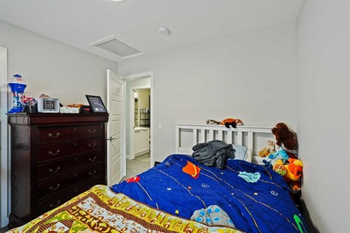 2320 Lancaster Heights Se, Airdrie, AB - Indoor Photo Showing Bedroom