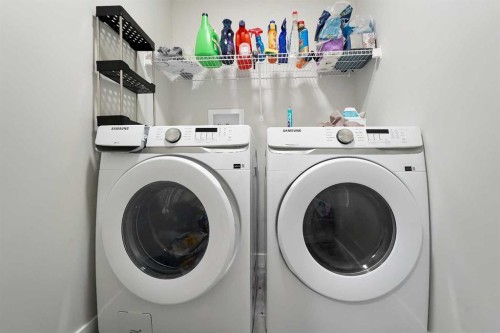 2320 Lancaster Heights Se, Airdrie, AB - Indoor Photo Showing Laundry Room