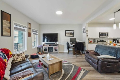 2320 Lancaster Heights Se, Airdrie, AB - Indoor Photo Showing Living Room