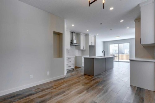 435 Rivercrest Road, Cochrane, AB - Indoor Photo Showing Kitchen With Upgraded Kitchen