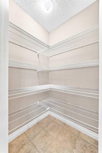 129-308 11 Avenue, High River, AB - Indoor With Storage