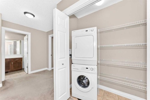 129-308 11 Avenue, High River, AB - Indoor Photo Showing Laundry Room