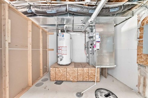 129-308 11 Avenue, High River, AB - Indoor Photo Showing Basement