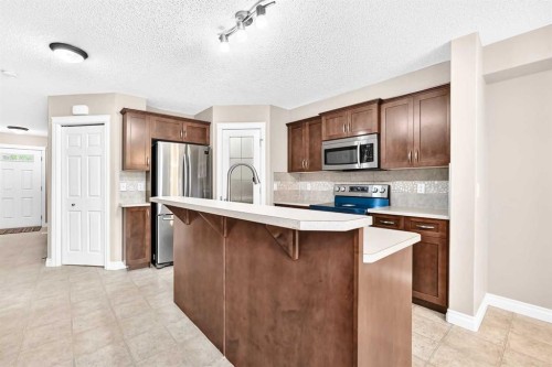 129-308 11 Avenue, High River, AB - Indoor Photo Showing Kitchen With Upgraded Kitchen