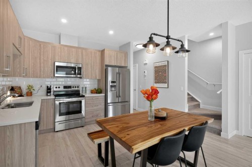 573 Canals Crossing Sw, Airdrie, AB - Indoor Photo Showing Kitchen With Stainless Steel Kitchen