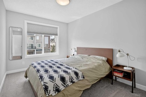 573 Canals Crossing Sw, Airdrie, AB - Indoor Photo Showing Bedroom