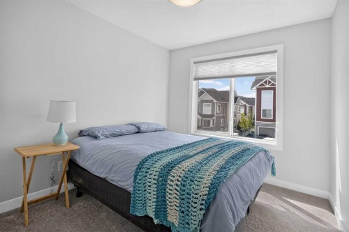 573 Canals Crossing Sw, Airdrie, AB - Indoor Photo Showing Bedroom