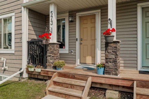 573 Canals Crossing Sw, Airdrie, AB - Outdoor With Deck Patio Veranda With Exterior