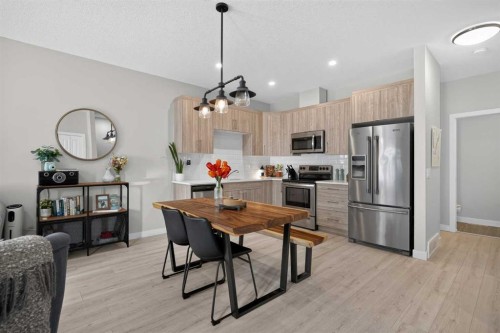 573 Canals Crossing Sw, Airdrie, AB - Indoor Photo Showing Kitchen With Stainless Steel Kitchen