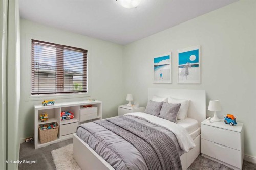 126 Chapman Close Se, Calgary, AB - Indoor Photo Showing Bedroom
