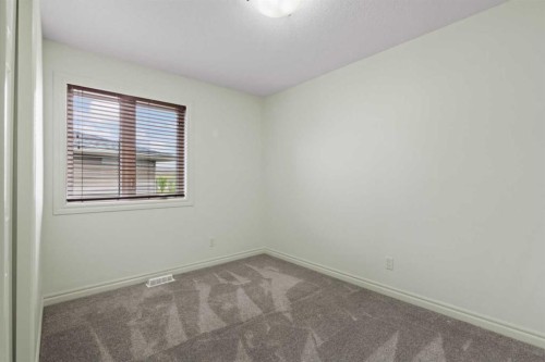 126 Chapman Close Se, Calgary, AB - Indoor Photo Showing Other Room