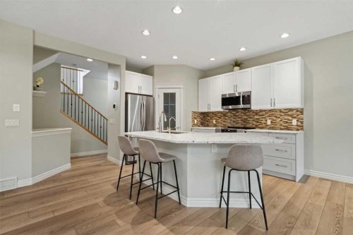 126 Chapman Close Se, Calgary, AB - Indoor Photo Showing Kitchen With Upgraded Kitchen