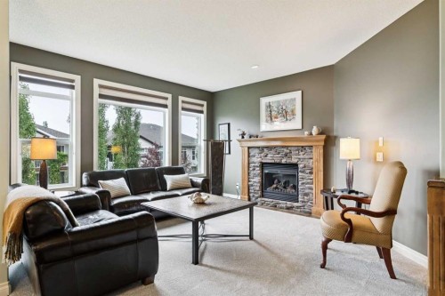 416 High Park Place Nw, High River, AB - Indoor Photo Showing Living Room With Fireplace