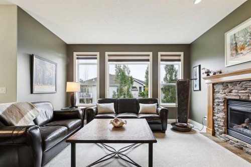 416 High Park Place Nw, High River, AB - Indoor Photo Showing Living Room With Fireplace