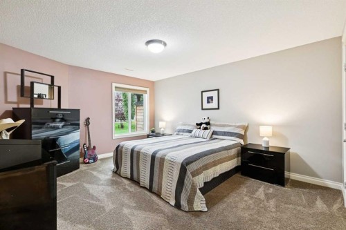 416 High Park Place Nw, High River, AB - Indoor Photo Showing Bedroom