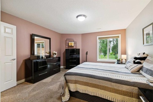 416 High Park Place Nw, High River, AB - Indoor Photo Showing Bedroom