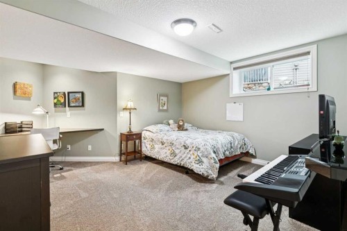 416 High Park Place Nw, High River, AB - Indoor Photo Showing Bedroom