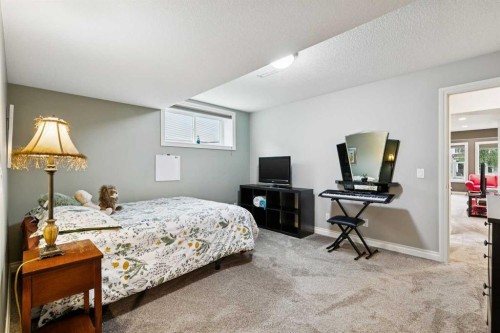 416 High Park Place Nw, High River, AB - Indoor Photo Showing Bedroom