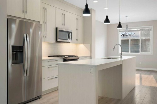 125 Corner Meadows Gate Ne, Calgary, AB - Indoor Photo Showing Kitchen With Upgraded Kitchen