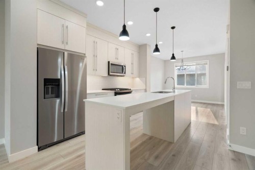125 Corner Meadows Gate Ne, Calgary, AB - Indoor Photo Showing Kitchen With Upgraded Kitchen