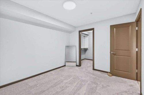 3111-310 Mckenzie Towne Gate Se, Calgary, AB - Indoor Photo Showing Other Room